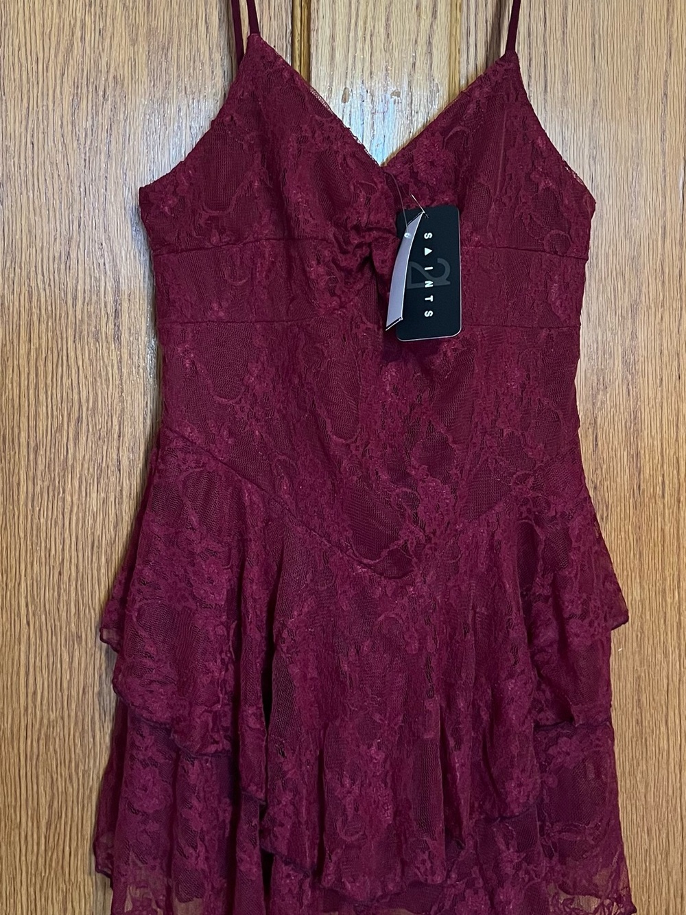 Burgundy blouse size large but I believe it comes small